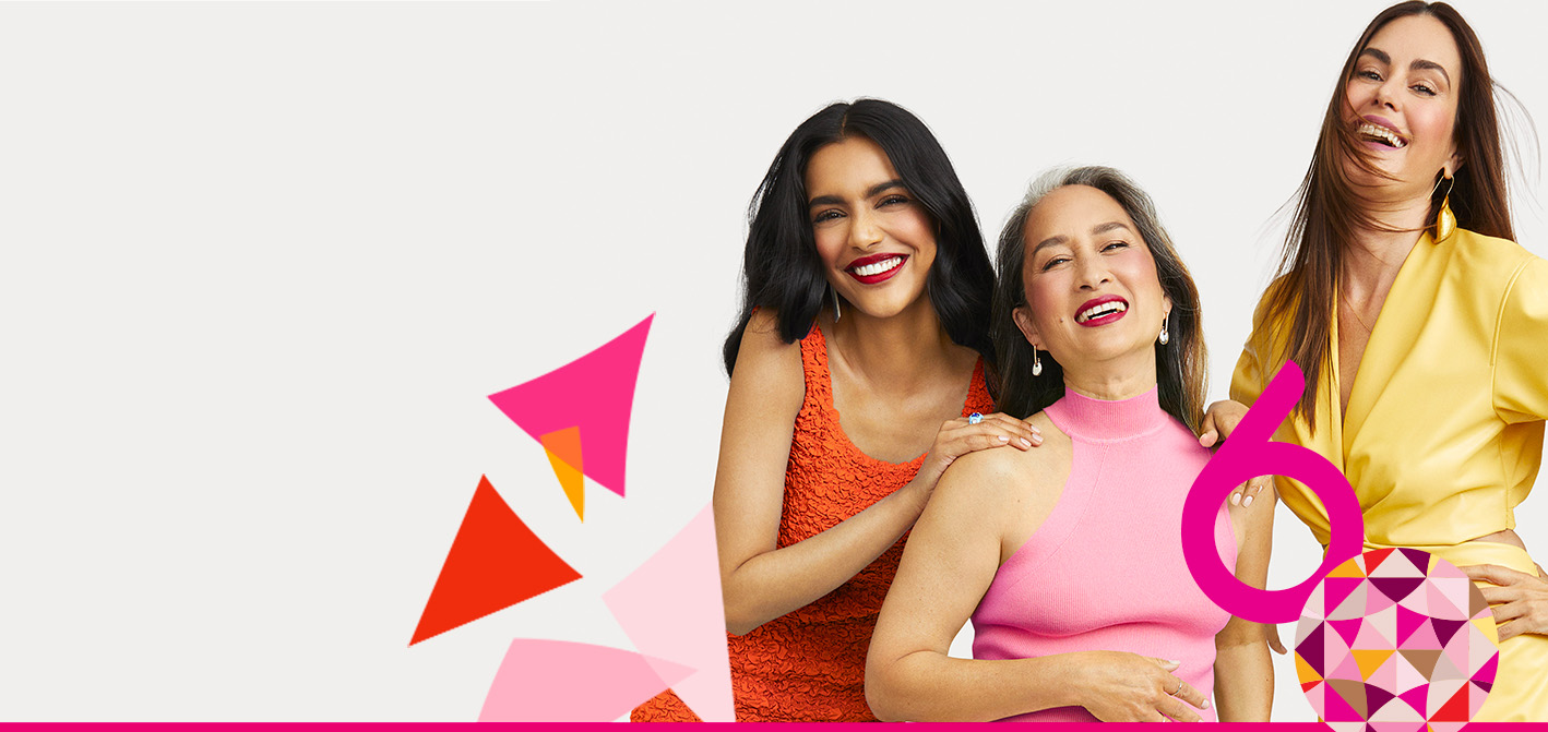 A group of smiling, diverse models celebrating the 60th anniversary of Mary Kay.