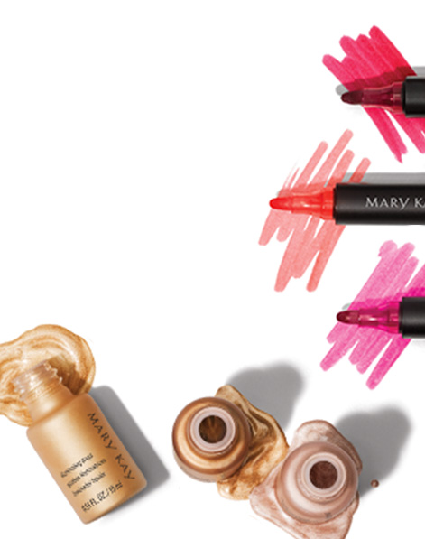 Two Mary Kay Lip Tints are shown atop swipes of product and one bottle of Mary Kay Illuminating Drops shown with product spilling out.  
