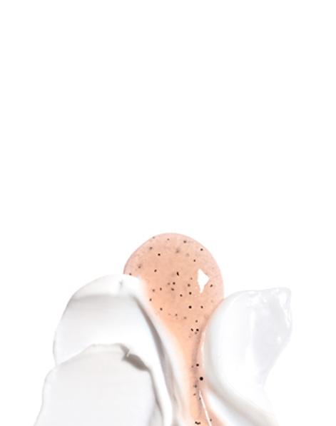 Product rubs of TimeWise Repair Revealing Radiance, TimeWise Microdermabrasion Refine and Botanical Effects Invigorating Scrub from Mary Kay against a white background.