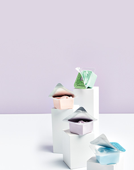 Limited Edition Mary Kay Mad About Masking Mask Pod Gift Set styled on white blocks against a purple background.