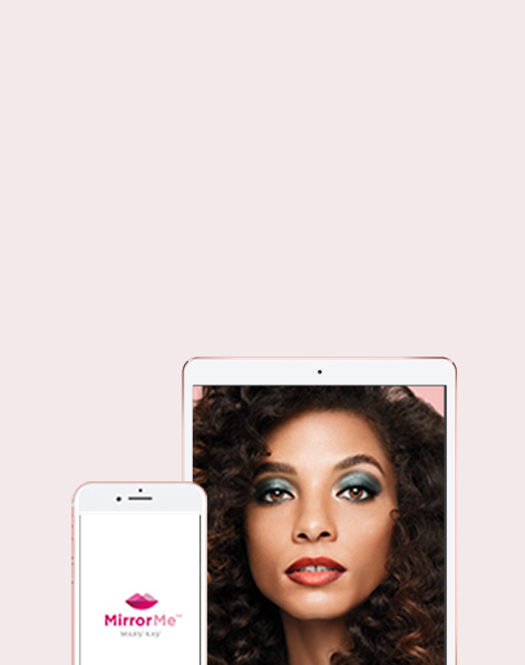 Model wearing Vivid Chrome makeup artist look placed in tablet screen next to Mary Kay MirrorMe home page on smartphone screen, against a light pink background.