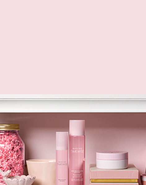 Mary Kay TimeWise products in new pink packaging styled against a pink background.