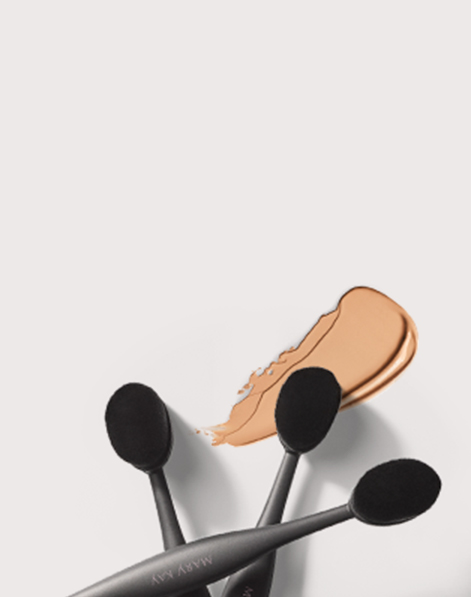 Three Mary Kay Blending Brushes stacked up together.
