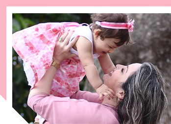 Image of woman and toddler laughing