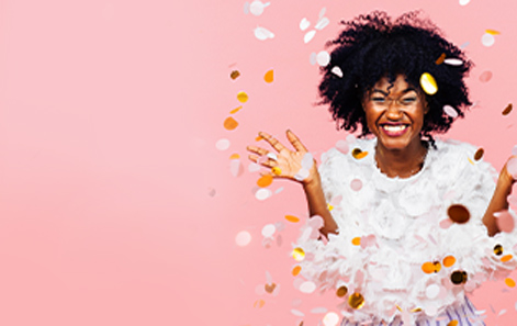 Image of woman with paper confetti