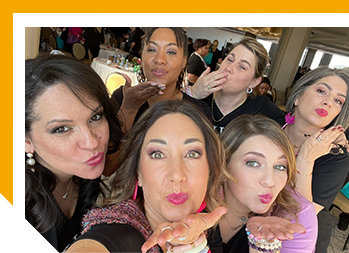 Image of women blowing kisses