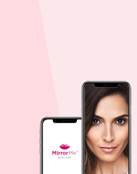 Model wearing Haute Honey makeup artist look from Mary Kay featured in smartphone next to another smartphone displaying Mary Kay MirrorMe welcome screen.