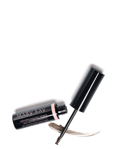 An open tube of Mary Kay Volumizing Brow Tint with wand placed over product smear.