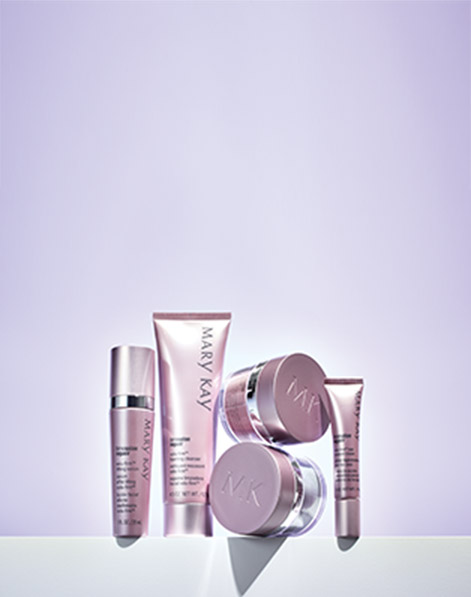 TimeWise Repair Volu-Firm Set styled against a purple background with centered highlight. 