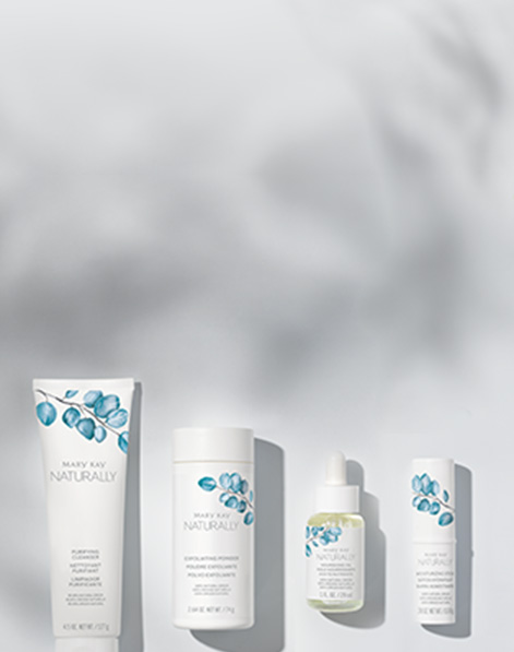 Mary Kay Naturally products with shadows of plants in the background