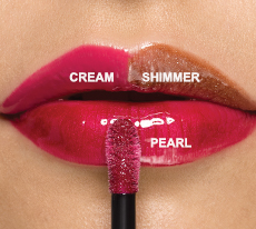 Three shades of new Mary Kay Unlimited Lip Gloss, one each in cream, pearl and shimmer finishes on medium beige skin. 