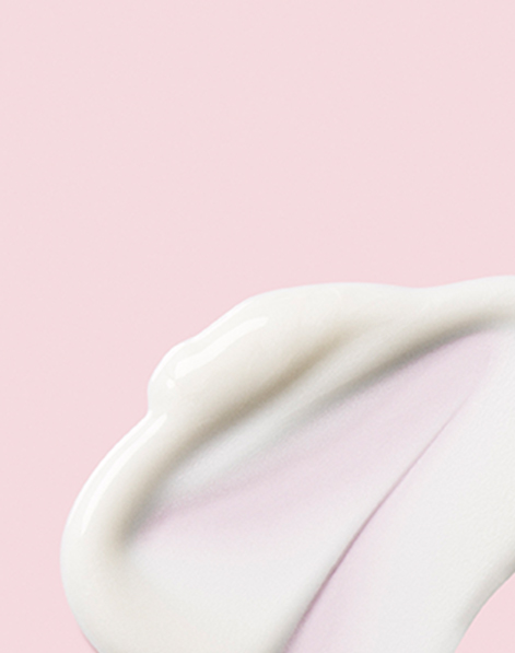 An artistic smear of the vitamin c and e serum TimeWise Replenishing Serum C+E