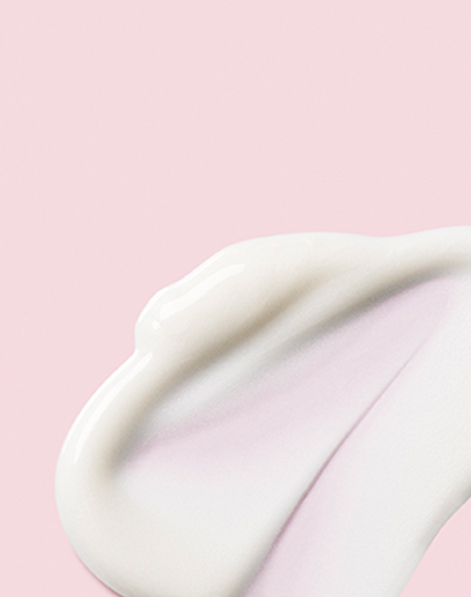 An artistic smear of the vitamin c and e serum TimeWise Replenishing Serum C+E